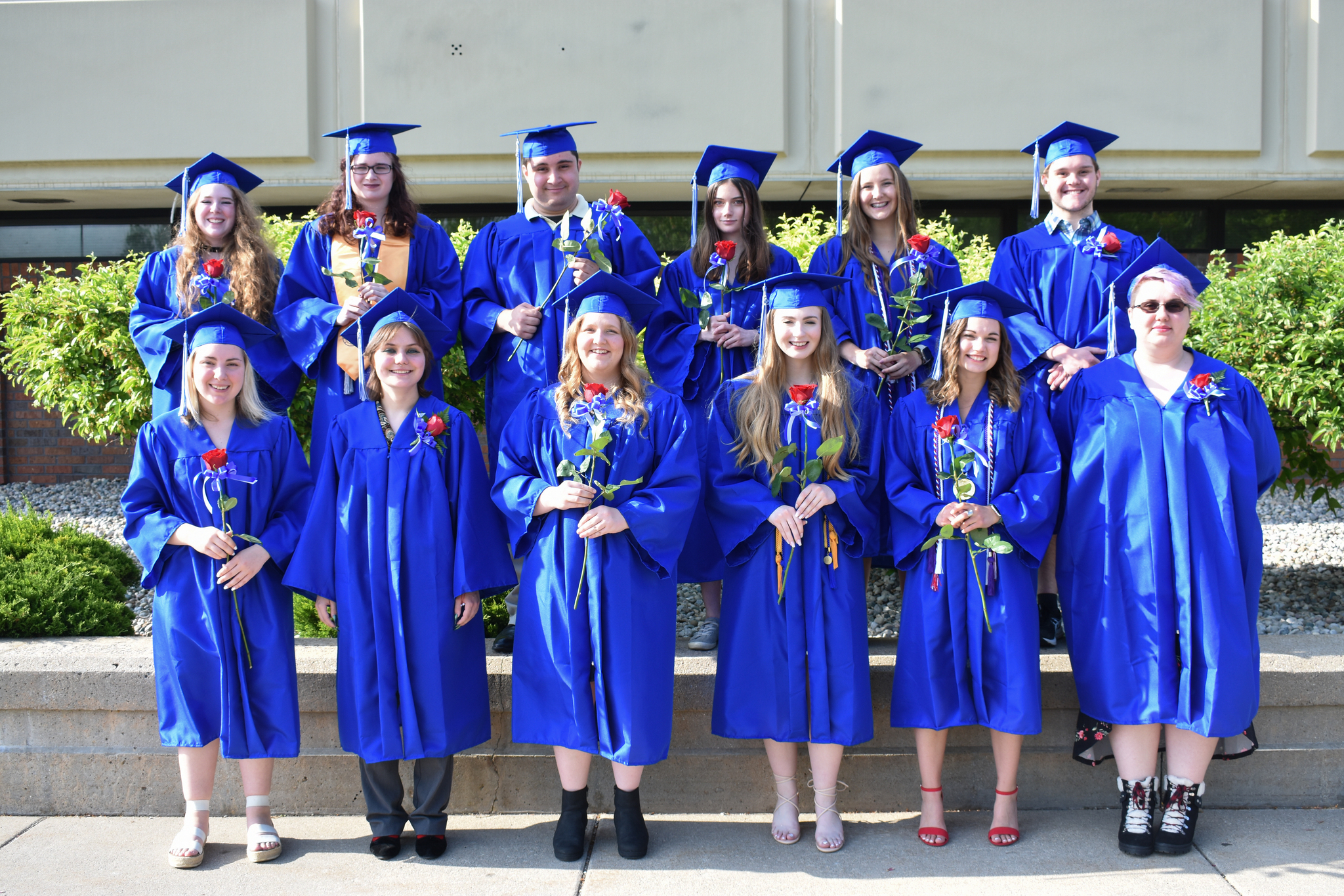 Students posing in graduation attire