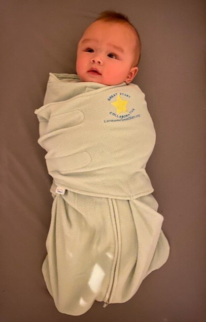 Baby in great Start swaddle